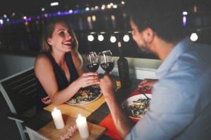 Romantic couple having dinner on valentines day