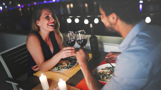 Romantic couple having dinner on valentines day